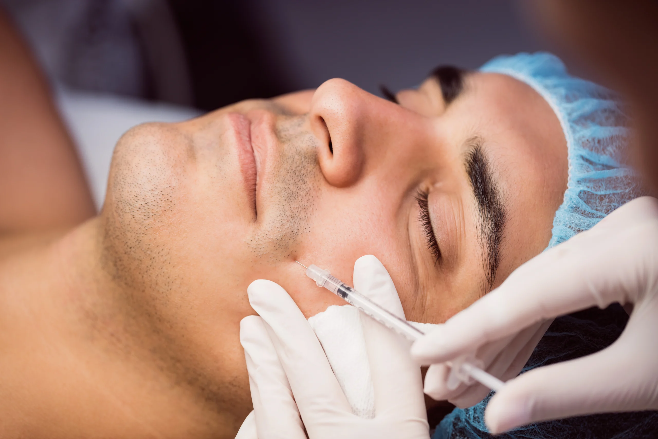 man getting botox treatment
